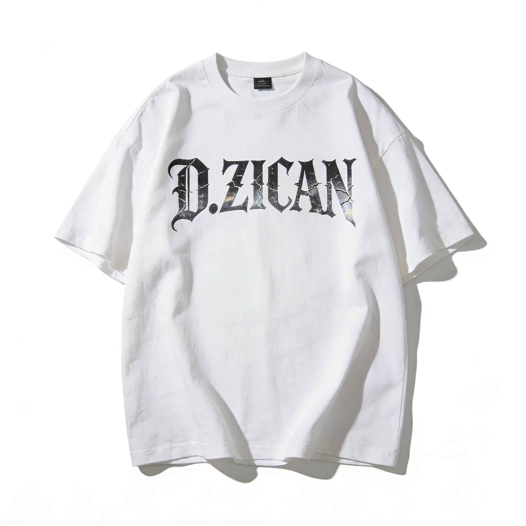 a white loose fit t shirt featuring a large