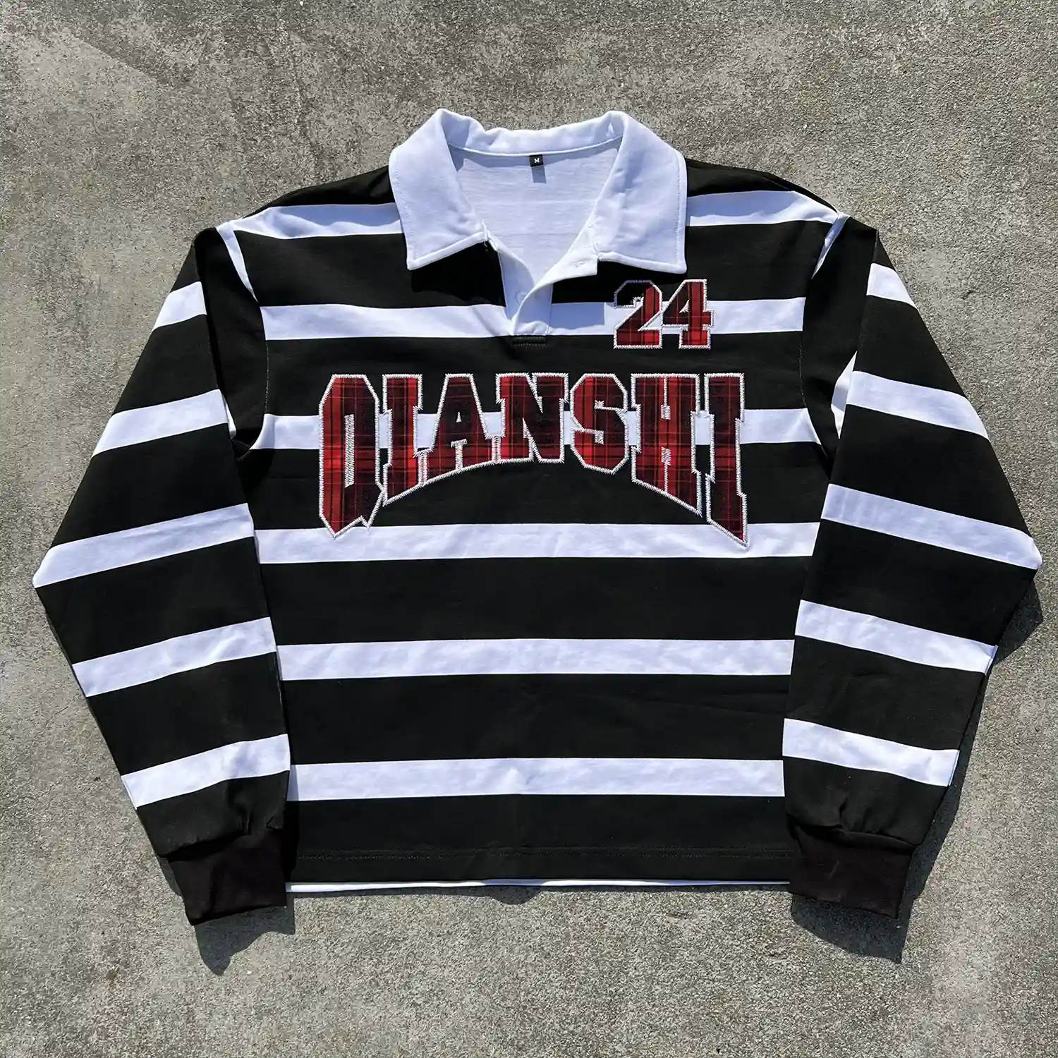 black white striped rugby polo shirt front view