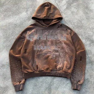 Front view of custom Y2K rhinestone distressed hoodie manufactured by Qianshiwear