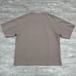 Flat lay back view showing the architectural double-needle seams on the premium heavyweight tee