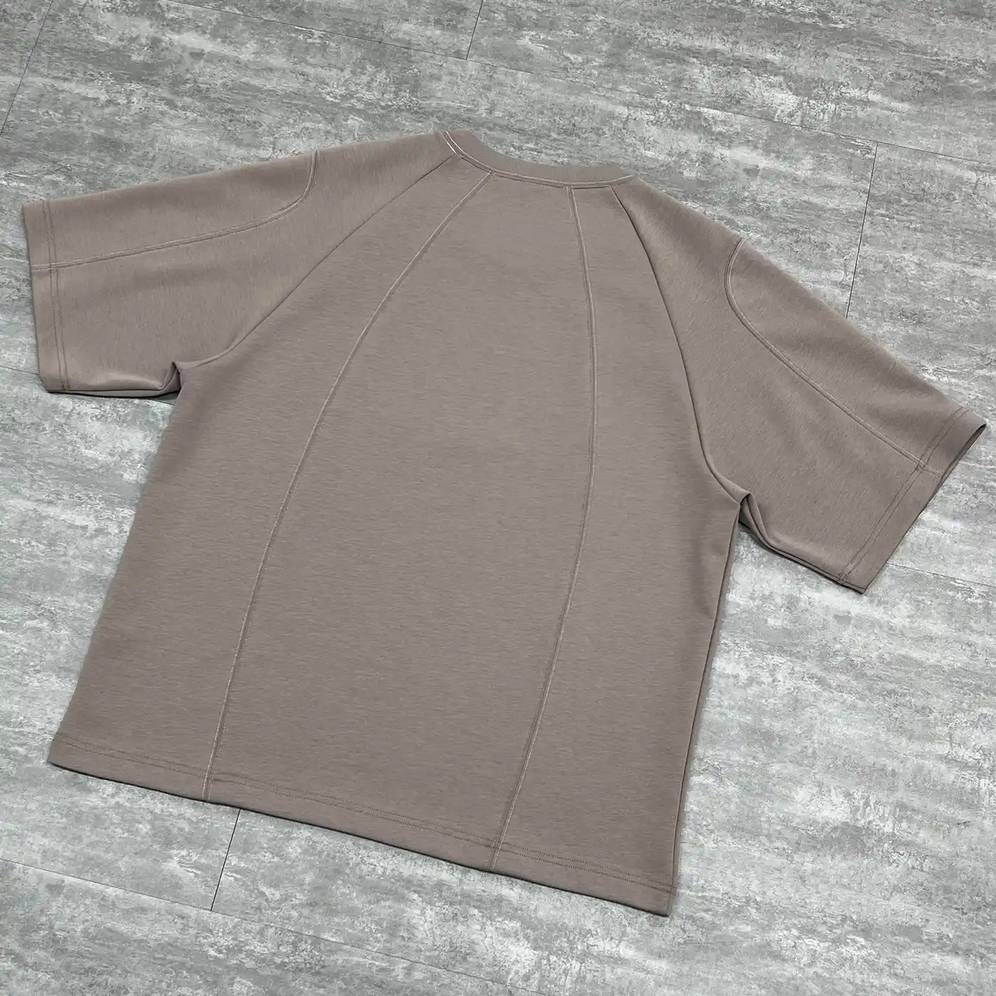 Angled back flat lay of the private label oversized structural tee supplier sample