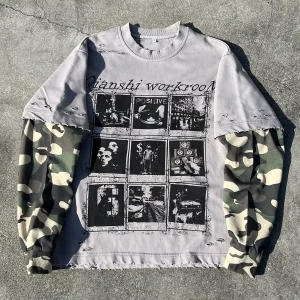 Front flat lay view of faded black custom vintage wash long sleeve tee for streetwear brands.