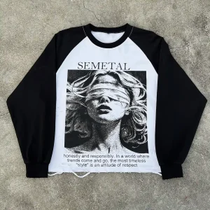 Front view of oversized custom distressed raglan shirt with graphic print.