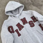 Chest and double-lined hood detail on heavy custom applique zip up hoodie.