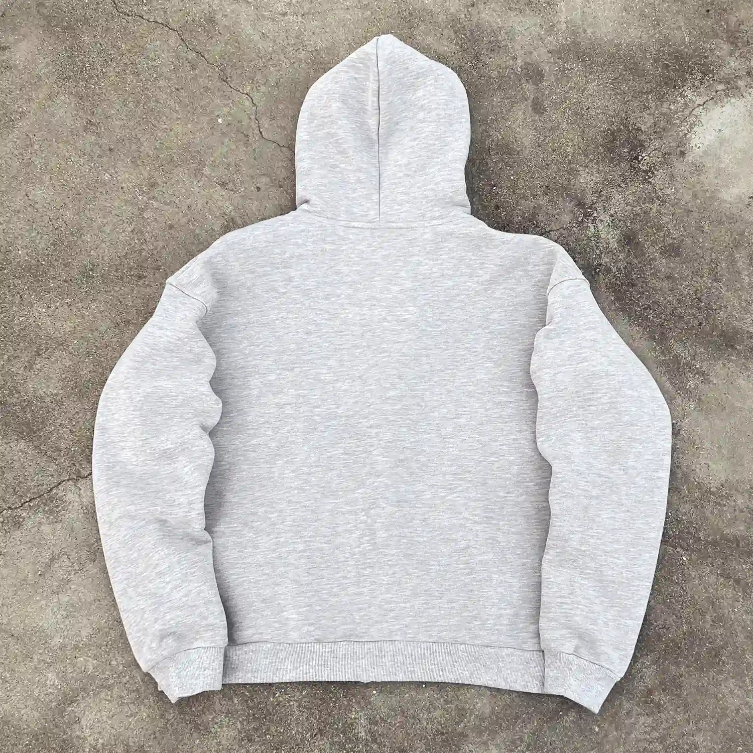 Back view of blank heather grey oversized zip up hoodie for bulk buyers.