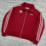 Angled view of retro B2B wholesale streetwear zip-up sweatshirt with stand collar.