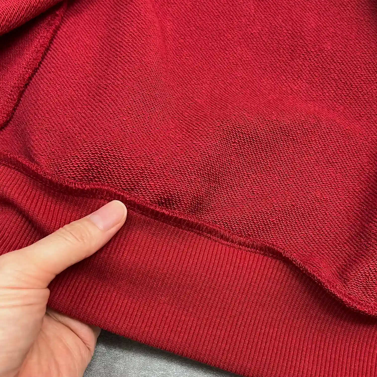 Macro fabric detail showing 380GSM heavyweight French terry loop interior.