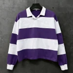 Front view of custom striped polo shirt hanging on a rack for OEM apparel display.