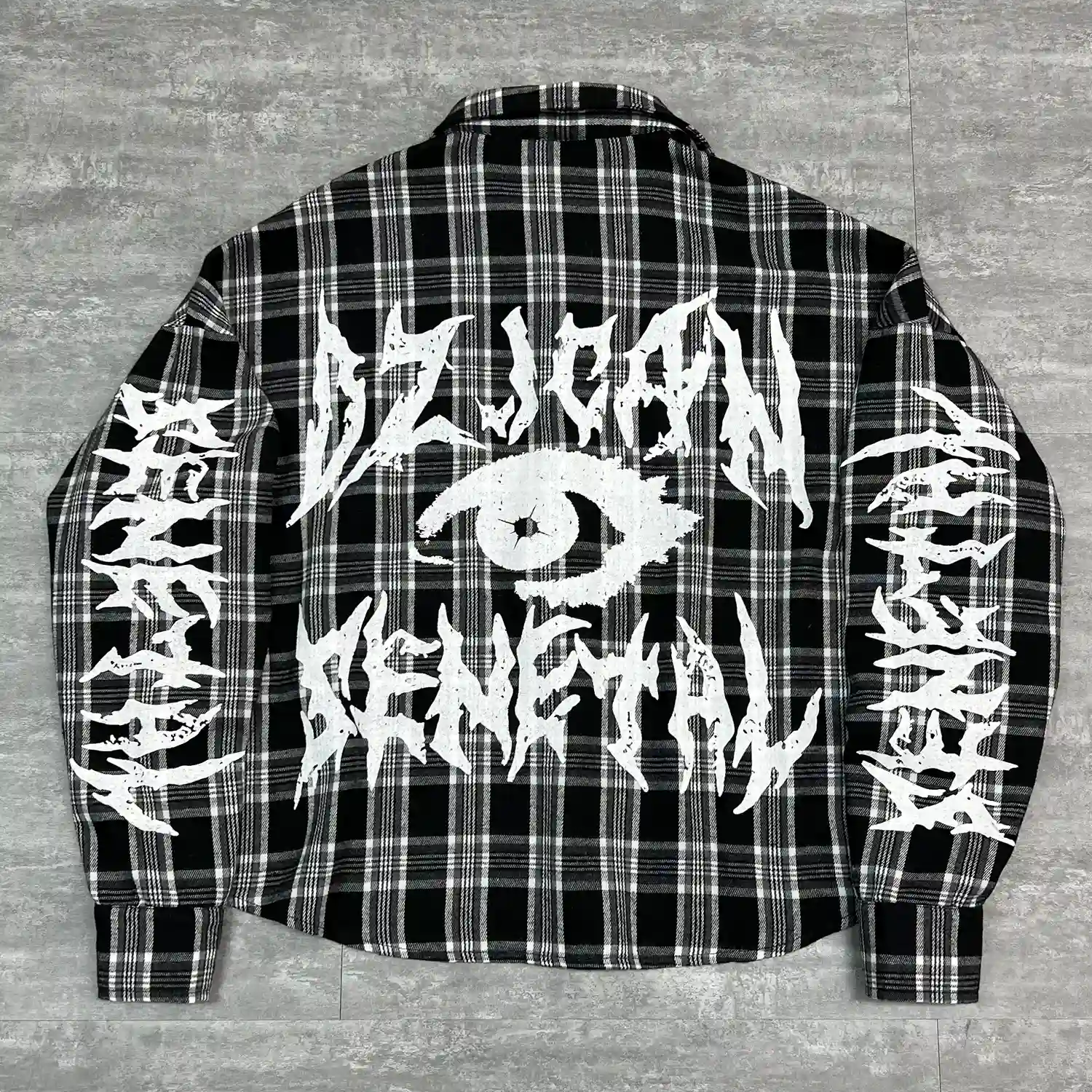 Close up of chest pocket and embroidery on custom oversized mesh shirt.