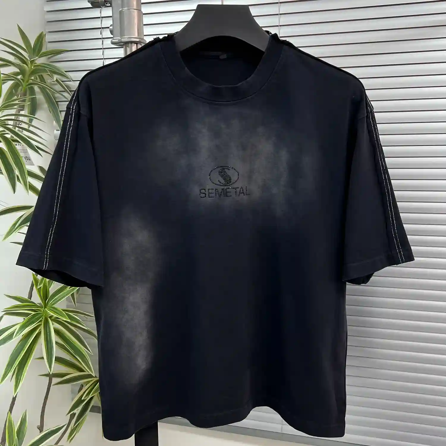 Hanging front display of the premium custom washed oversized t-shirt for B2B buyers.