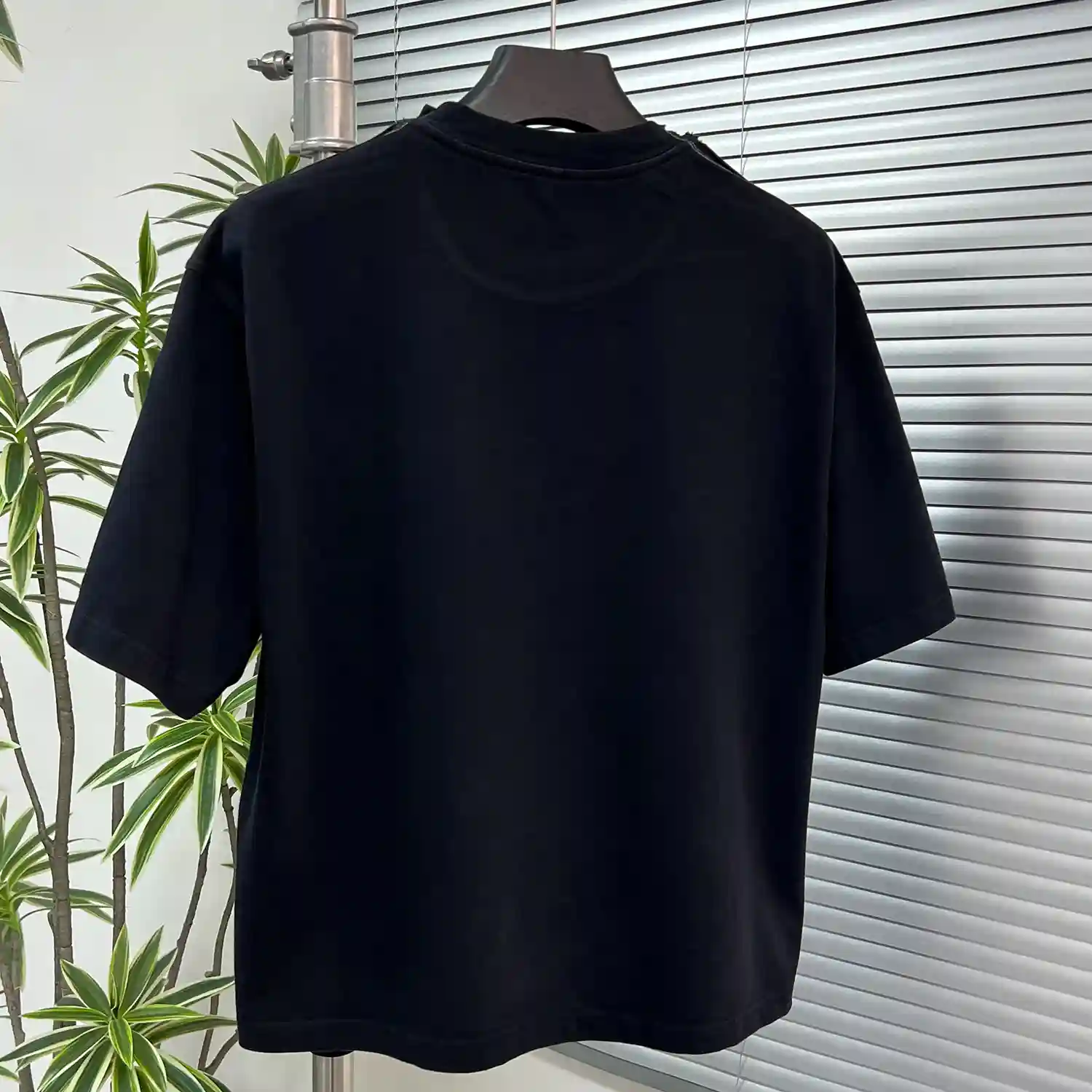 Hanging back view of the blank vintage washed heavyweight tee for OEM customization.