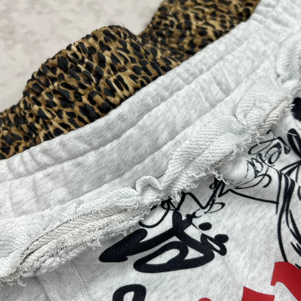 custom graffiti sweatpants leopard waistband and distressed edge detail
