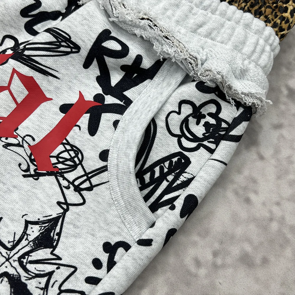 custom graffiti sweatpants pocket and raw edge waistband close up