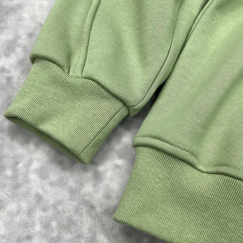 custom half zip hoodie rib cuff and hem construction detail