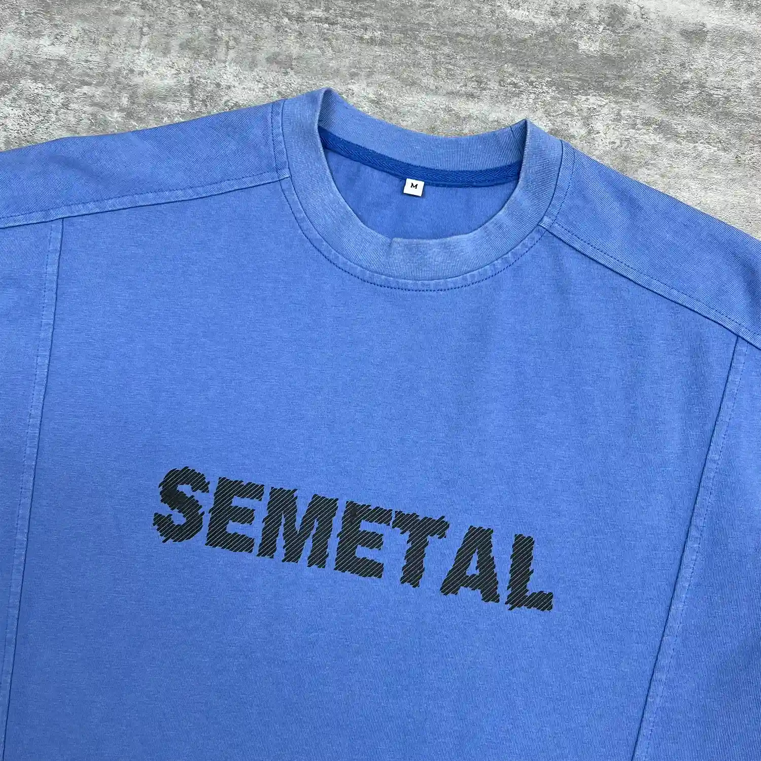 custom oversized t shirt close up with rib neck and raised chest logo