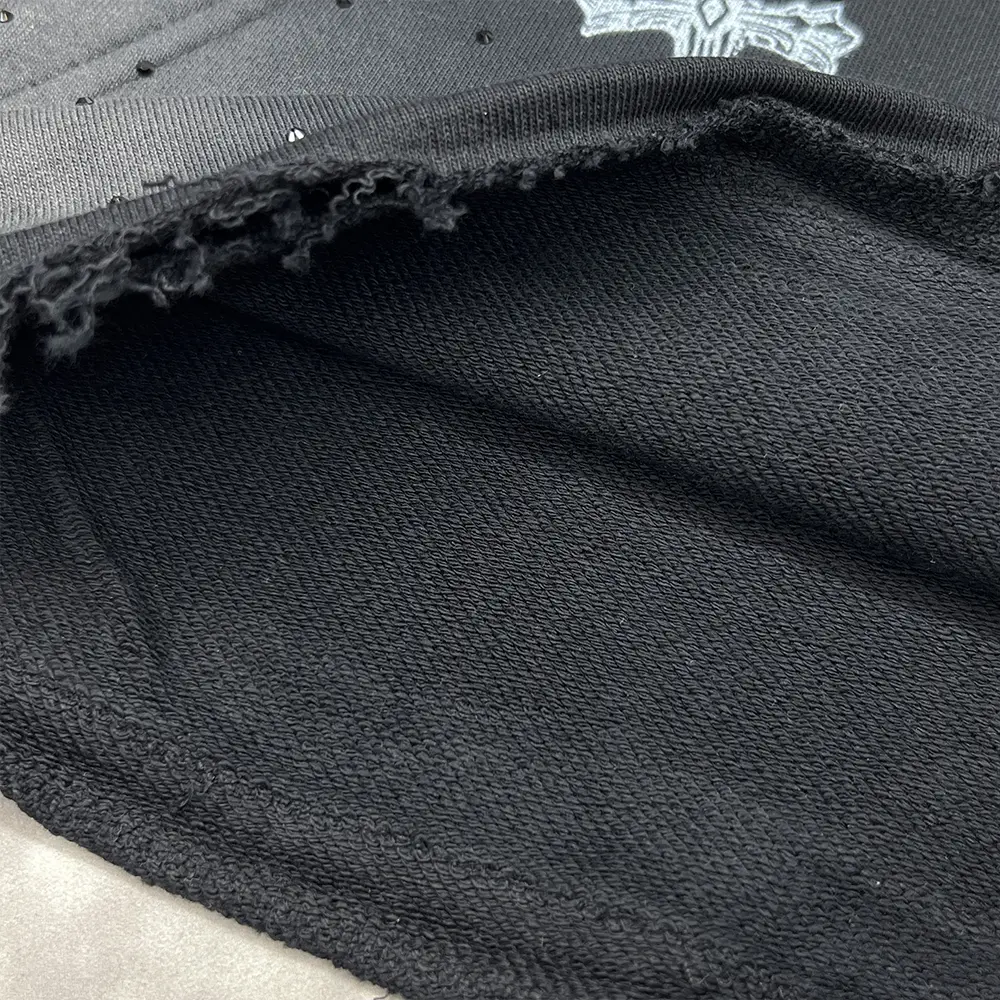 custom rhinestone hoodie french terry fabric and raw hem close up