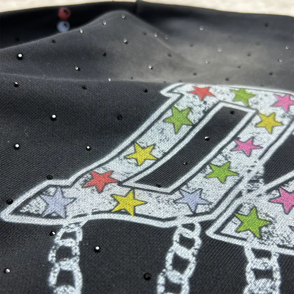 custom rhinestone hoodie star graphic and rhinestone print detail