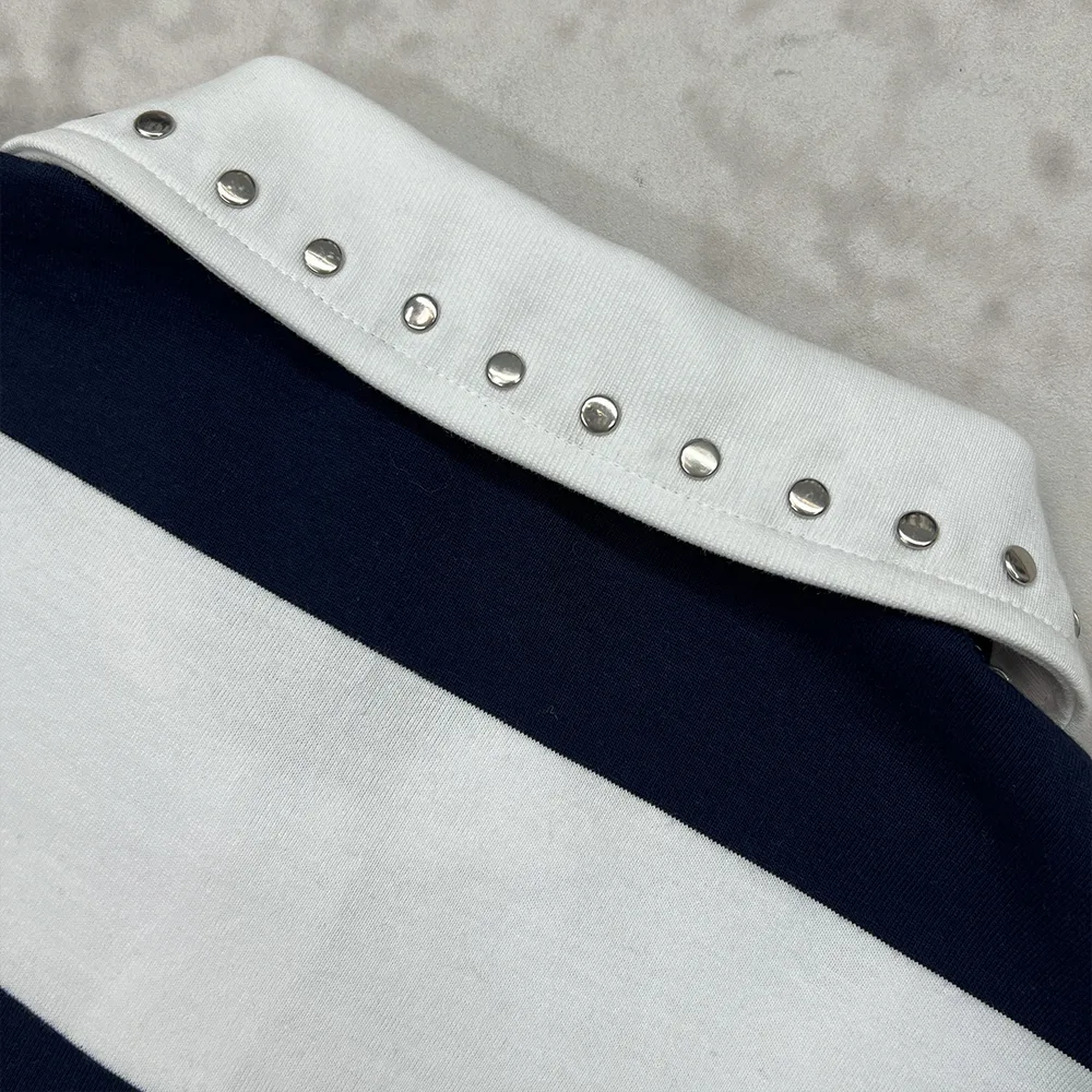 custom striped polo shirt metal rivet collar close up